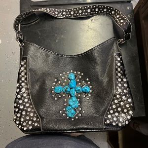 Shoulder bag western style. Bling on strap and side of bag. Faux turquoise cross